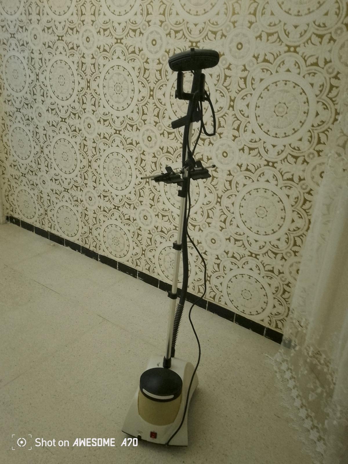 repasseur a vapeur pour vtements  et tapis fauteuils