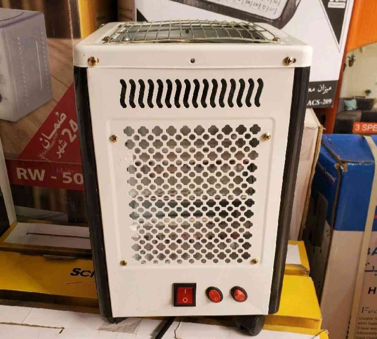 مدفأة  موقد طهي من الأعلى 2في1  REVOLTEC 2000W - Alger Centre, Alger - Tijelabin